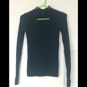 Dark green Jessica Simpson sweater with cut out.